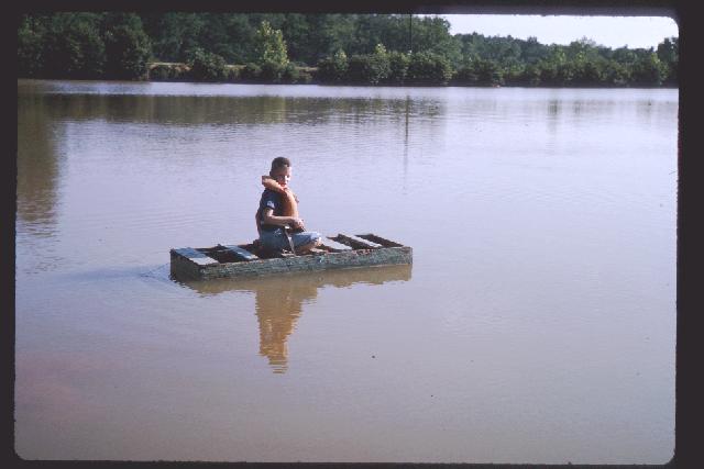 Neil and his boat.jpeg (28095 bytes)